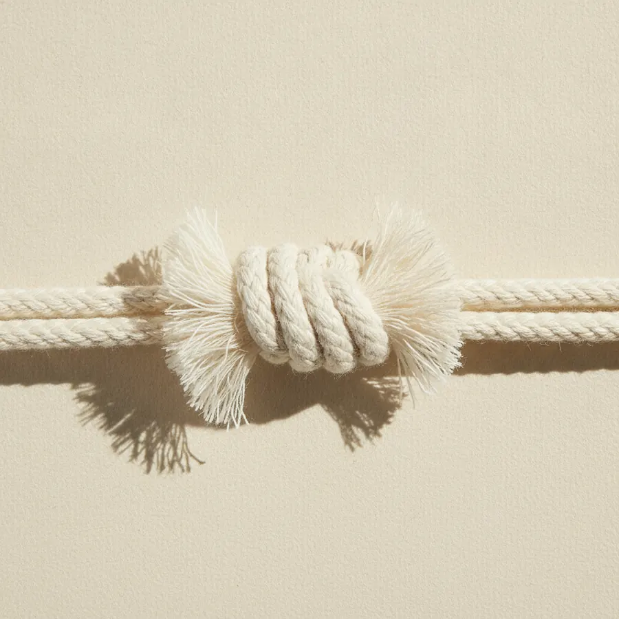 Macro detail of a tight cotton knot